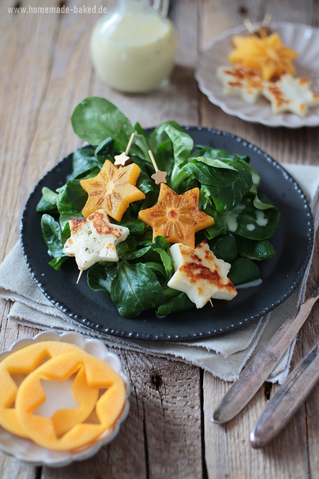 feldsalat mit orangen-buttermilchdressing und gebratenen kaki halloumi spießen